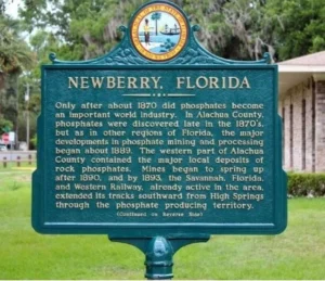 Image of a historical marker describing the history behind Newberry, Florida.
