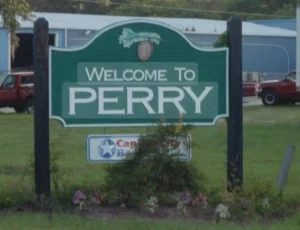 Roadside image of the welcome to Perry, Florida sign.